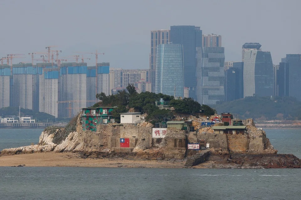 Shiyu or Lion Islet, which is part of Kinmen County, one of Taiwan's offshore islands, is seen with China's Xiamen in the background, in Kinmen, Taiwan, on 18 December 2023. (Ann Wang/Reuters)