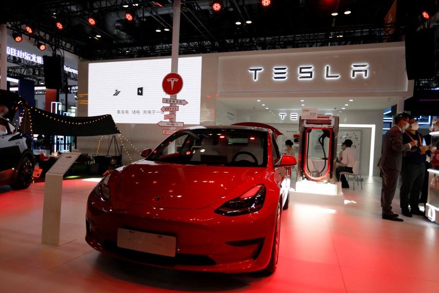 A Tesla Model 3 electric vehicle (EV) is displayed at the China International Fair for Trade in Services (CIFTIS) in Beijing, China 1 September 2022. (Florence Lo/Reuters)
