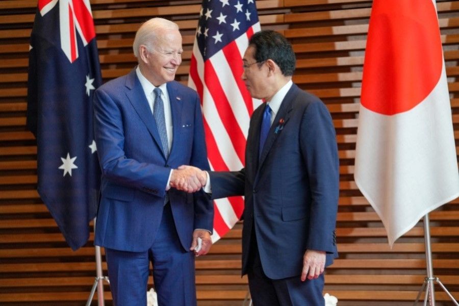 Prime Minister of Japan Fumio Kishida welcomes US President Joe Biden at the entrance hall of the Prime Minister's Office of Japan in Tokyo, Japan, 24 May 2022. (Zhang Xiaoyu/Pool via Reuters)