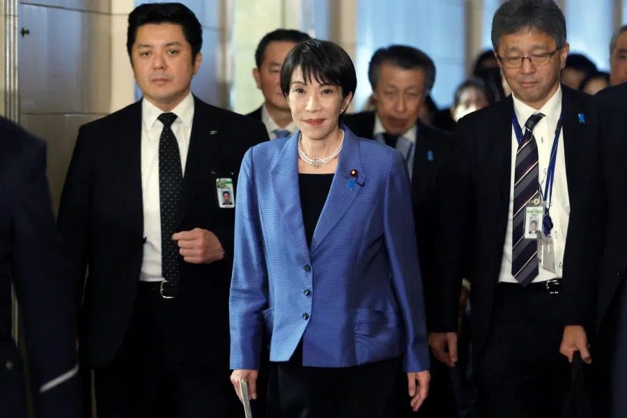 Sanae Takaichi, Japan’s prime minister, centre, arrives for a party leaders’ debate at the upper house of parliament in Tokyo, Japan, on 26 November 2025. (Kiyoshi Ota/Bloomberg)