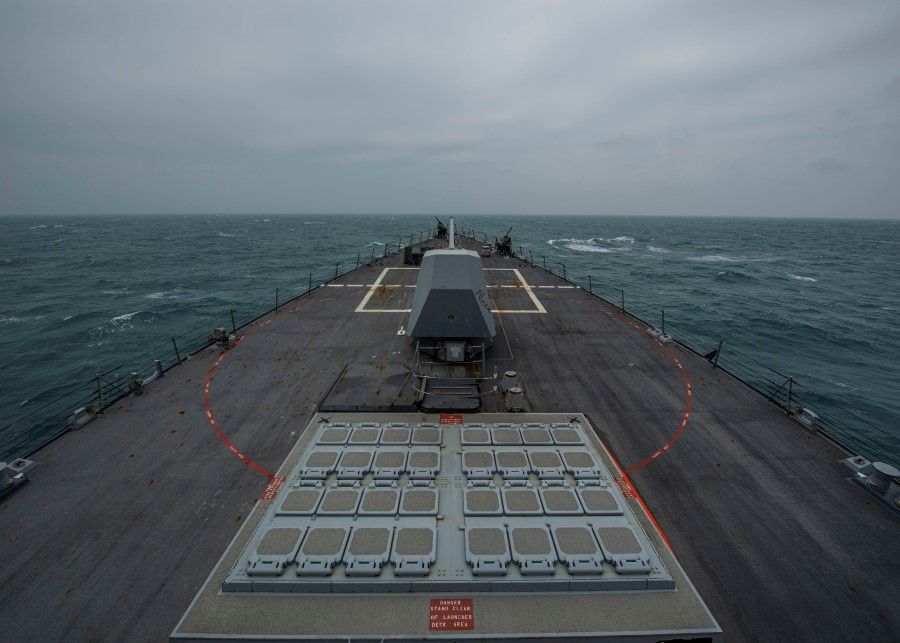 United States Navy Arleigh Burke-class guided-missile destroyer USS John Finn (DDG 113) transits the Taiwan Strait 10 March 2021 in this handout provided by the US Navy. (Jason Waite/U.S. Navy/Handout via Reuters)