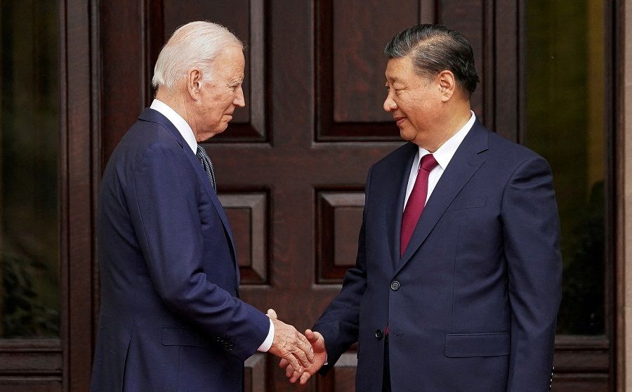 US President Joe Biden shakes hands with Chinese President Xi Jinping at Filoli estate on the sidelines of the Asia-Pacific Economic Cooperation (APEC) summit, in Woodside, California, US, on 15 November 2023. (Kevin Lamarque/Reuters)