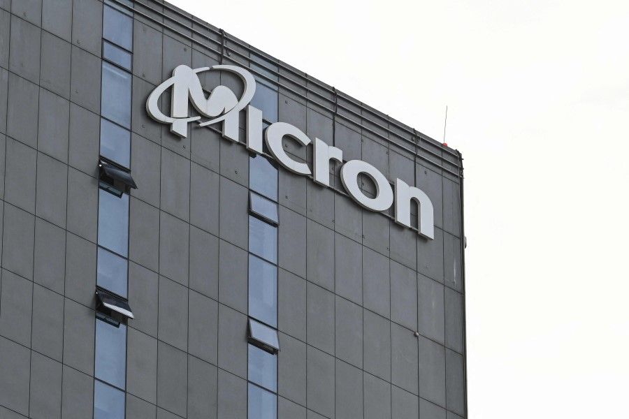 A view of a building where the facilities of US semiconductor giant Micron is located in Shanghai, China, on 22 May 2023. (Hector Retamal/AFP)