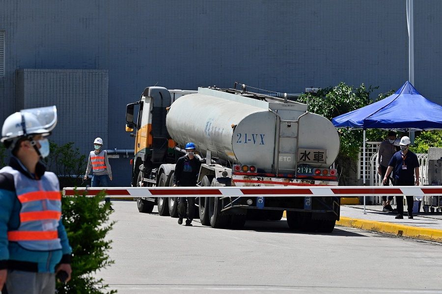 This photo taken on 25 March 2021 shows a water truck arriving at a Taiwan Semiconductor Manufacturing Company factory in Taichung, central Taiwan. (Sam Yeh/AFP)