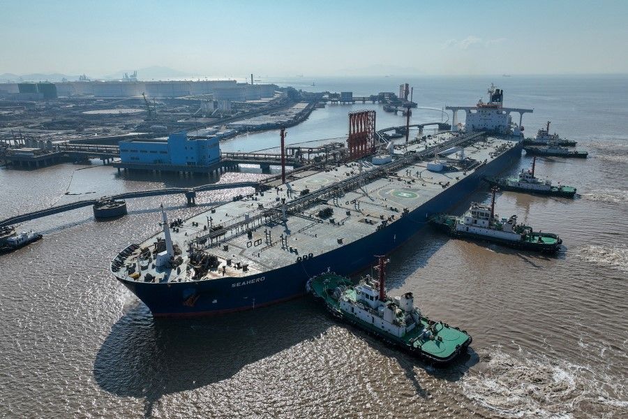 An aerial view shows a crude oil tanker at an oil terminal off Waidiao island in Zhoushan, Zhejiang province, China, 4 January 2023. (China Daily via Reuters)