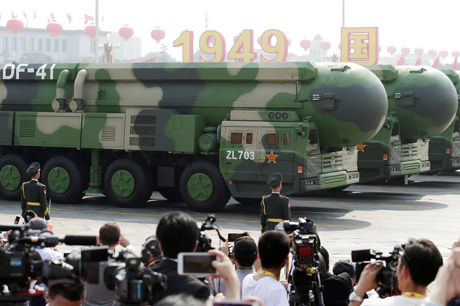 Military vehicles carrying DF-41 intercontinental ballistic missiles travel past Tiananmen Square during the military parade marking the 70th founding anniversary of People’s Republic of China, on its National Day in Beijing, China on 1 October 2019. (Jason Lee/Reuters)