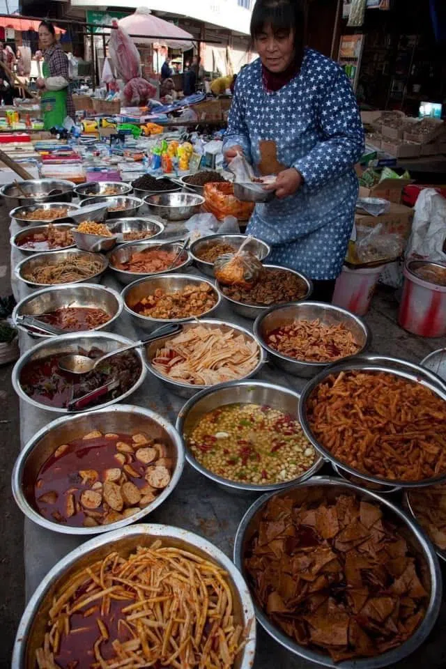 Chili spice vendor in Chongqing, 1995. (Photo: Koichi Saito)