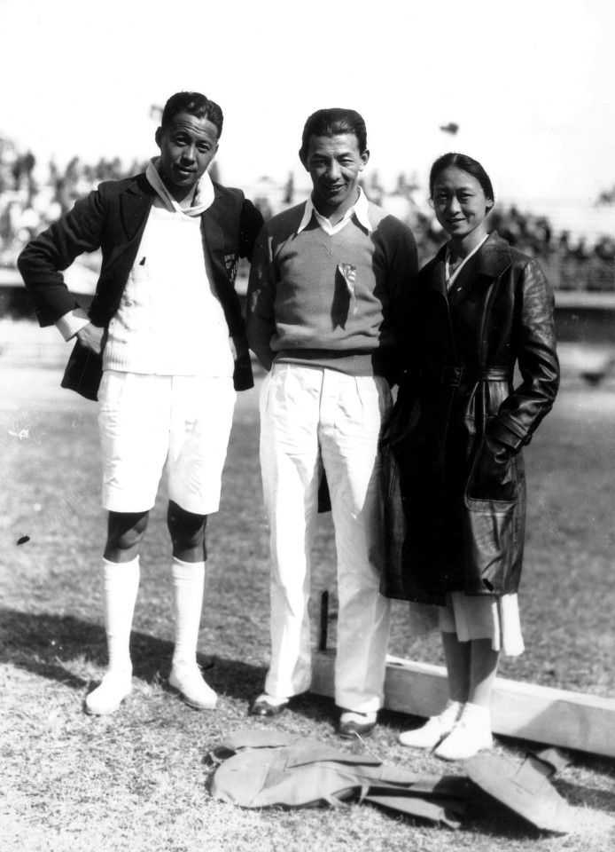 In October 1935, the Sixth National Athletic Meet under the Nationalist government was held in Shanghai. The photo shows guests dressed in the latest fashion - a woman in a black leather jacket and white leather shoes, and two men in all-white ensembles.