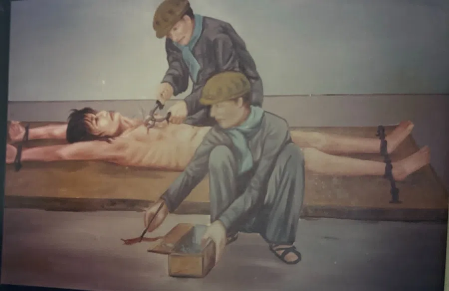 The Cambodian government under Hun Sen displayed a painting depicting the massacres during the Khmer Rouge regime, 1986.