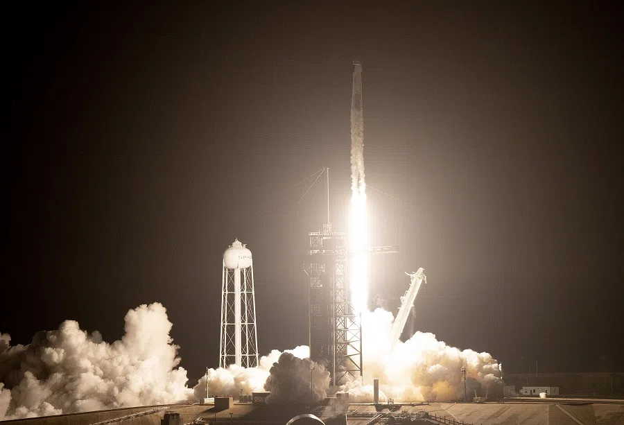 SpaceX Falcon 9 rocket with the Crew Dragon spacecraft lifts off with four astronauts on board from launch pad 39A at the Kennedy Space Center on 10 November 2021 in Cape Canaveral, Florida, US. (Joe Raedle/Getty Images/AFP)