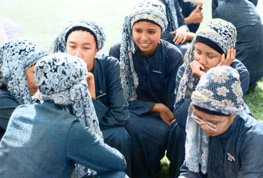 Young Malay girls in beautiful dresses, 1970s. Their pretty headwear are typical of the Malay community.