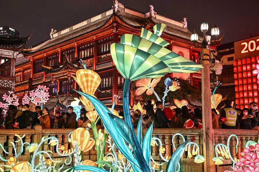 People visit Yu Garden ahead of the Year of the Rabbit, in Shanghai, China, on 9 January 2023. (Hector Retamal/AFP)