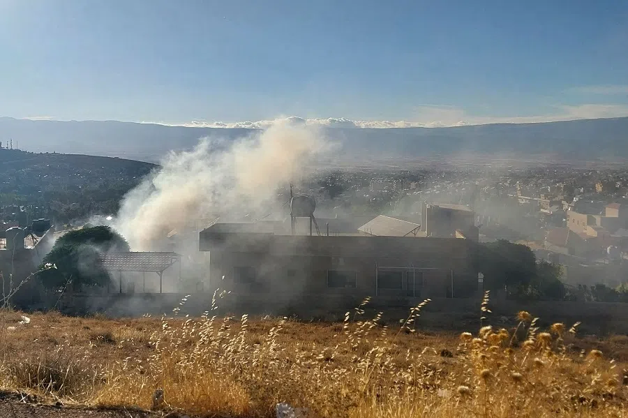Smoke billows from a house in Baalbek in east Lebanon after a reported explosion of a radio device, on 18 September 2024, amid ongoing cross-border tensions between Israel and Hezbollah fighters. (AFP)