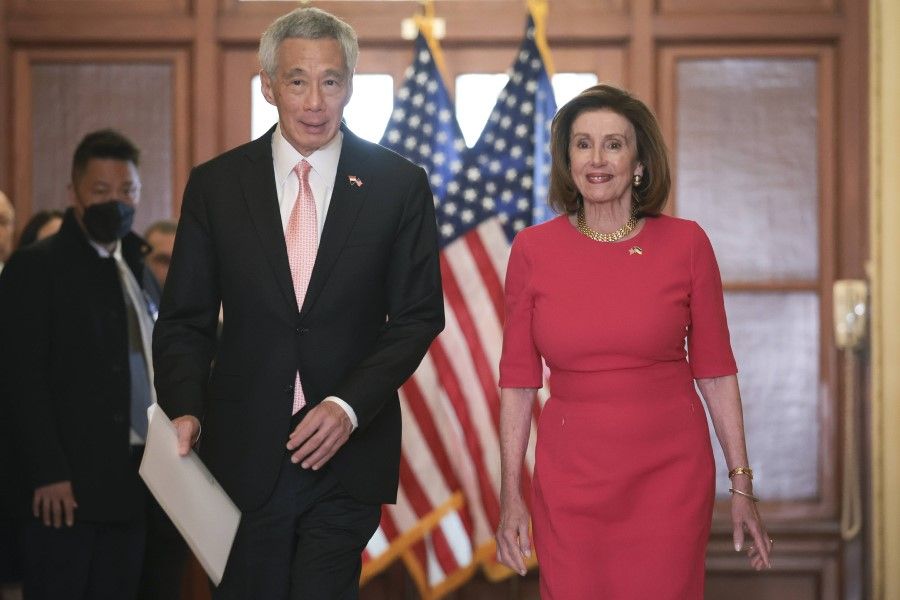 US Speaker of the House Nancy Pelosi (right) accompanies Singapore Prime Minister Lee Hsien Loong (left) at the US Capitol, 30 March 2022 in Washington, DC. (Win McNamee/Getty Images/AFP)