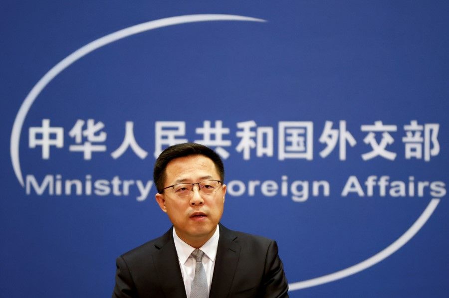 China's foreign ministry spokesperson Zhao Lijian attends a news conference in Beijing, China, 16 November 2021. (Carlos Garcia Rawlins/Reuters)