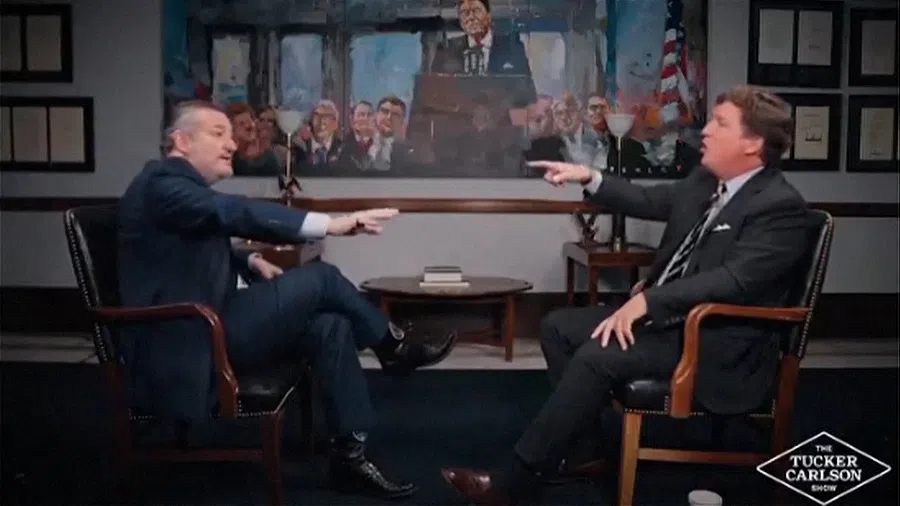 Conservative podcast host and commentator Tucker Carlson engages in an exchange with US Senator Ted Cruz of Texas on the subject of the US’s involvement in the conflict between Israel and Iran, in a still image from video released 17 June 2025. (Tucker Carlson Network/Handout via Reuters)
