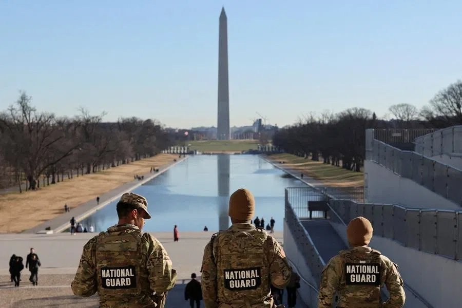 Members of the US National Guard patrol the Lincoln Memorial, with the Washington Monument in the background, in Washington, DC, US on 22 December 2025. (Tyrone Siu/Reuters)