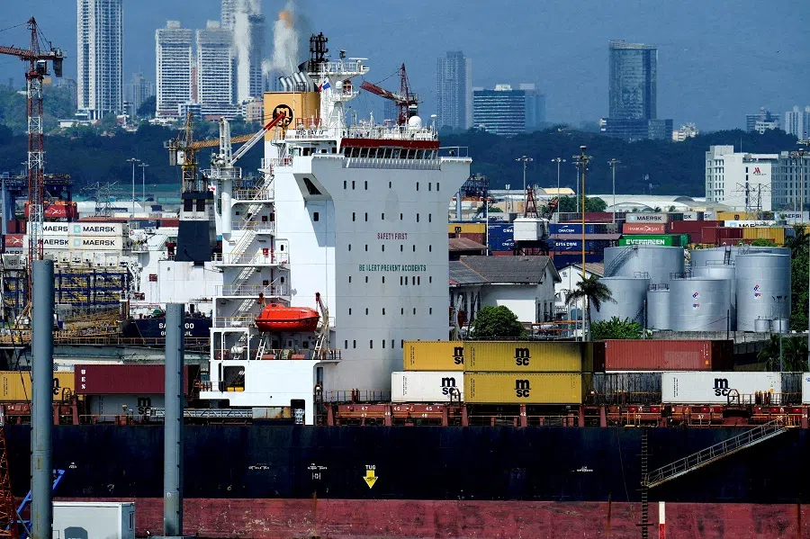A ship sails near the Balboa Port in Panama City, Panama, on 4 March 2025. (Enea Lebrun/Reuters)