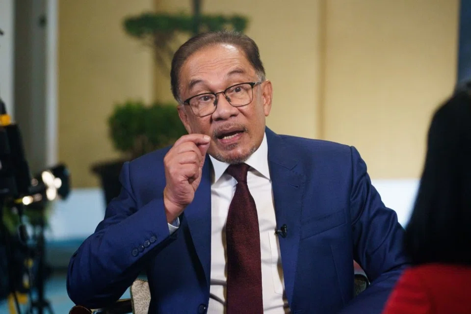 Anwar Ibrahim, Malaysia's prime minister, speaks during an interview in Singapore, on 30 January 2023. (Ore Huiying/Bloomberg)