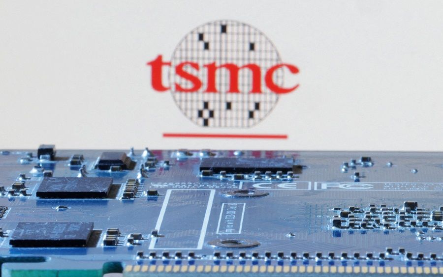 Taiwan Semiconductor Manufacturing Company (TSMC) logo is seen near computer motherboard in this illustration taken on 8 January 2024. (Dado Ruvic/Illustration/Reuters)