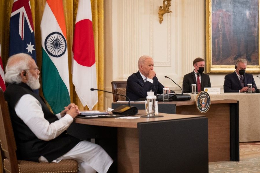 US President Joe Biden, top centre, hosts a meeting with Indian Prime Minister Narendra Modi, left, in the East Room of the White House in Washington, DC, US, on 24 September 2021. (Sarahbeth Many/Bloomberg)