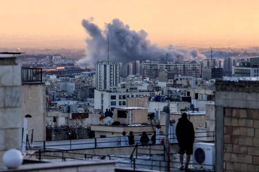 A plume of smoke rises after a strike on the Iranian capital Tehran, on 3 March 2026.