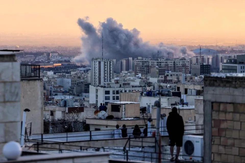 A plume of smoke rises after a strike on the Iranian capital Tehran, on 3 March 2026. (Atta Kenare/AFP)