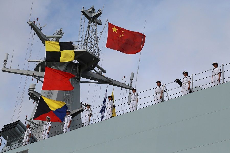 Soldiers of China's People's Liberation Army (PLA) stand on a ship sailing off to set up a base in Djibouti, from a military port in Zhanjiang, Guangdong province, China, 11 July 2017. (Stringer/File Photo/Reuters)