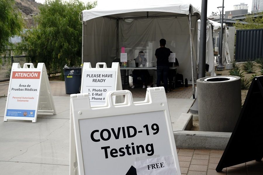 A "Covid-19" sign at a coronavirus testing site at the San Ysidro Port of Entry in San Diego, California, US, on 25 August 2020. (Bing Guan/Bloomberg)