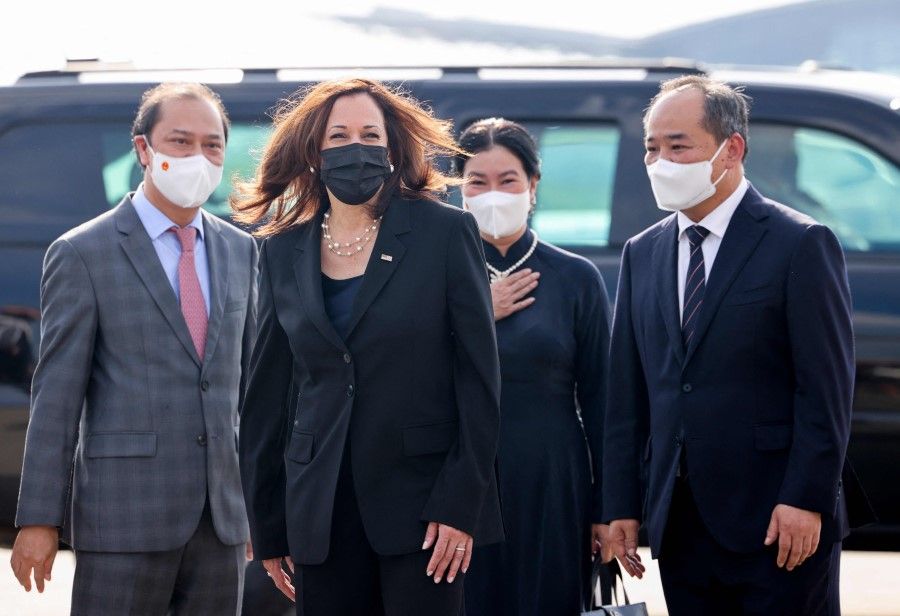 US Vice President Kamala Harris (second from left) prepares to depart Vietnam at Noi Bai International Airport, following her first official visit to Asia, in Hanoi on 26 August 2021. (Evelyn Hockstein/AFP)