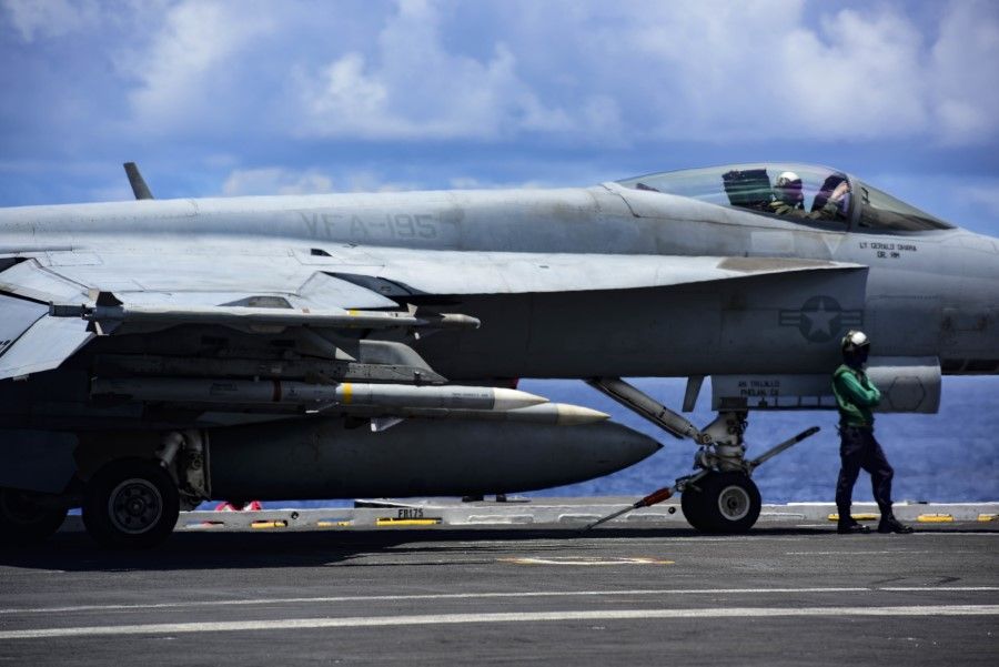 An aircraft prepares to launch off the flight deck of carrier USS Ronald Reagan while conducting operations in the South China Sea, 14 August 2020. (US Navy Mass Communication Specialist 3rd Class Jason Tarleton/US navy website)