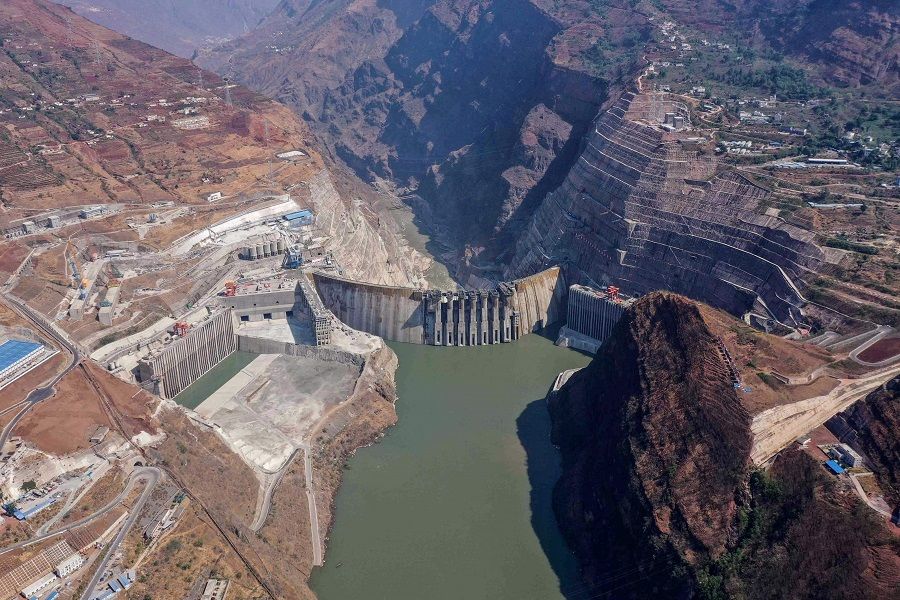 This aerial photo taken on 22 April 2021 shows the construction site of the Baihetan hydropower station in Zhaotong, Yunnan province, China. (STR/AFP)