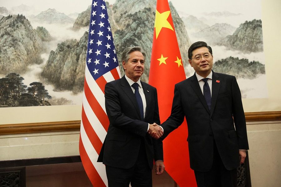 US Secretary of State Antony Blinken (left) and China's Foreign Minister Qin Gang shake hands ahead of a meeting at the Diaoyutai State Guesthouse in Beijing, China, on 18 June 2023. (Leah Millis/Pool/AFP)