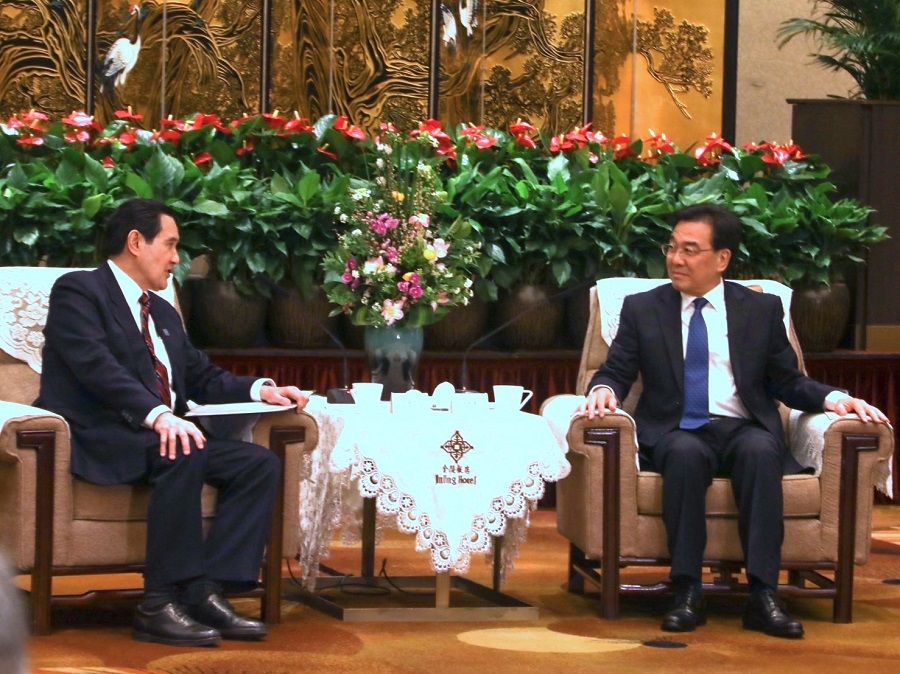 This handout picture taken and released from former Taiwan President Ma Ying-jeou's office on 28 March 2023 shows former Taiwanese President Ma Ying-jeou (left) speaking to China's Jiangsu CCP secretary Xin Changxing in Nanjing, Jiangsu province, China, on 28 March 2023. (Handout/AFP)