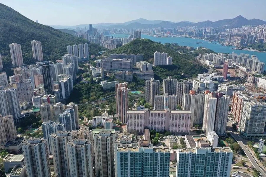 This aerial photo shows a view of residential and commercial tower blocks on the eastern side of Hong Kong island on 3 April 2022. (Peter Parks/AFP)