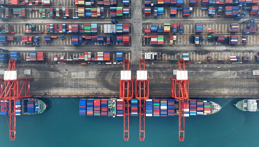 This photo taken on 13 January 2023 shows an aerial view of cranes and shipping containers at Lianyungang port in Jiangsu province, China. (AFP)