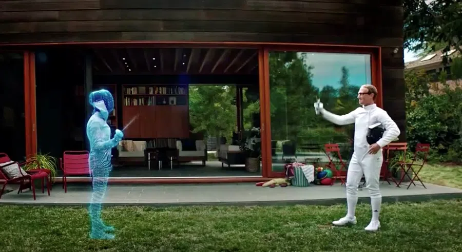 Facebook CEO Mark Zuckerberg is seen fencing in the metaverse with an Olympic gold medal fencer during a live-streamed virtual and augmented reality conference to announce the rebrand of Facebook as Meta, in this screen grab taken from a video released 28 October 2021. (Facebook/Handout via Reuters)