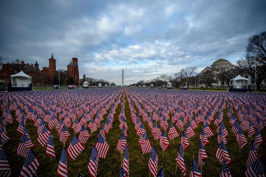 Thousands of flags creating a "field of flags" are seen on the National Mall ahead of Joe Biden's swearing-in inauguration ceremony as the 46th US president in Washington,DC on 18 January 2021. (Eric Baradat/AFP)
