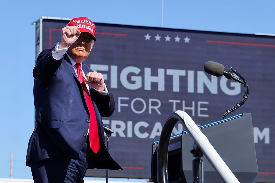 US President Donald Trump gestures after speaking in a campaign rally at Laughlin/Bullhead International Airport in Bullhead City, Arizona, US, 28 October 2020. (Jonathan Ernst/Reuters)
