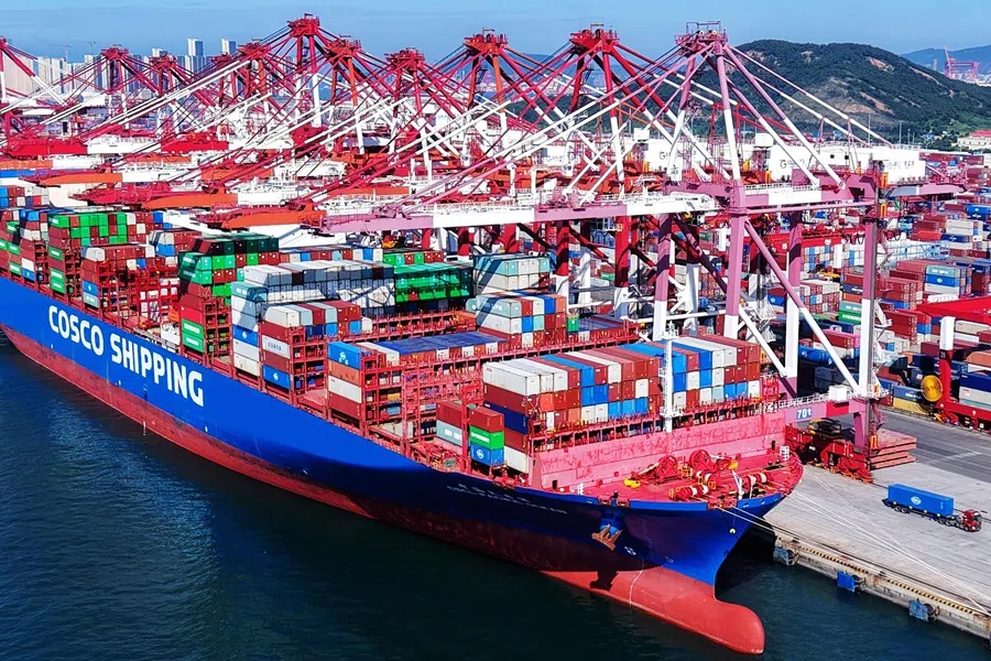 A COSCO container ship is berthed at the port in Qingdao, in China’s eastern Shandong province on 28 July 2025.
