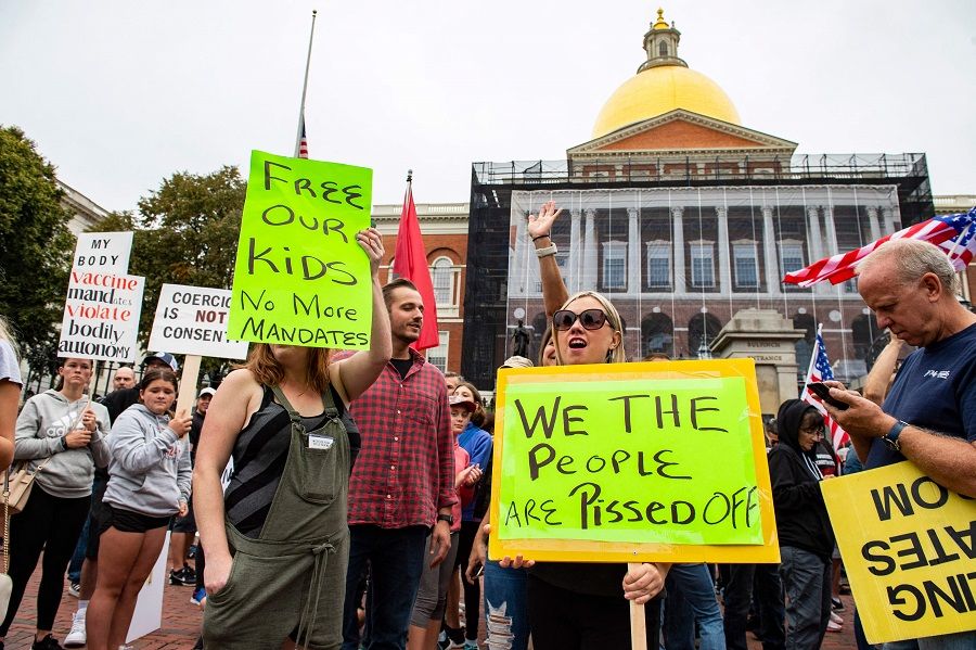 Demonstrators gathered outside the Massachusetts State House in Boston to protest Covid-19 vaccination and mask mandates. (Joseph Prezioso/AFP)