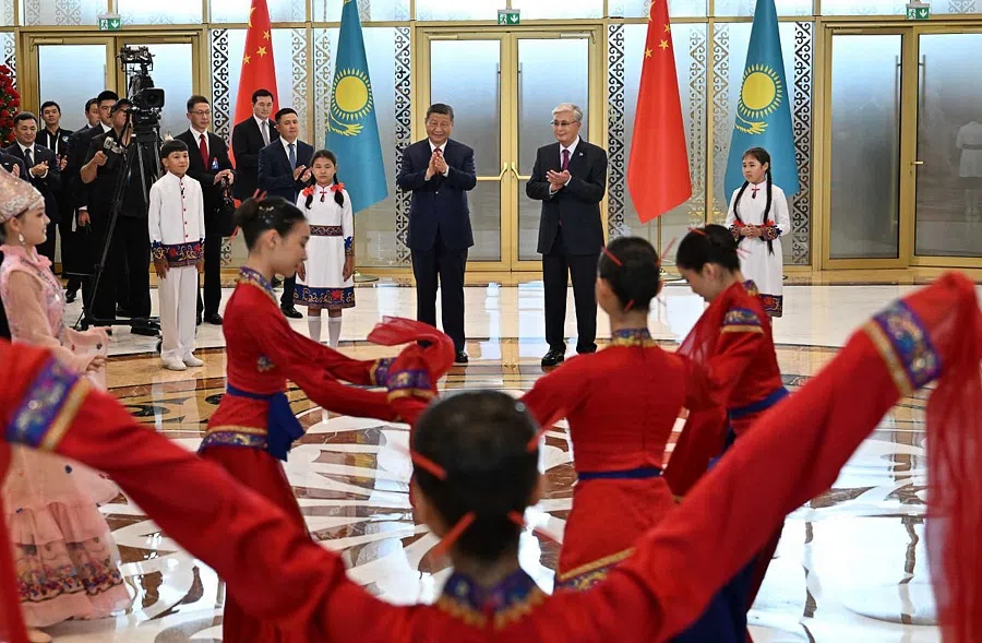 Kazakhstan’s President Kassym-Jomart Tokayev welcomes China’s President Xi Jinping upon his arrival at the airport in Astana on 16 June 2025, to attend the second China-Central Asia Summit. (Kazakhstan’s Presidential Press Service/AFP)