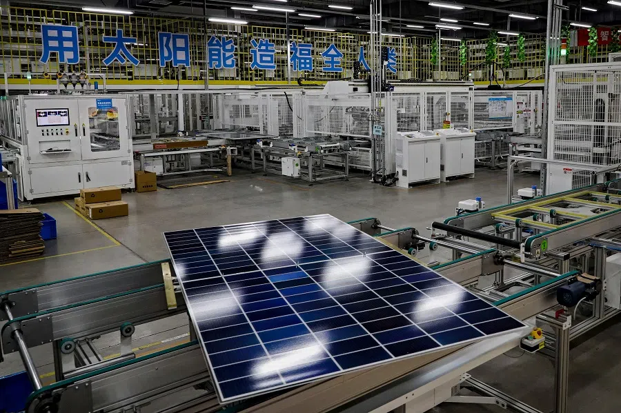 This photo taken on 4 June 2024 shows a solar photovoltaic panel on a production line at a factory in Huai’an, in eastern China’s Jiangsu province.  (AFP)