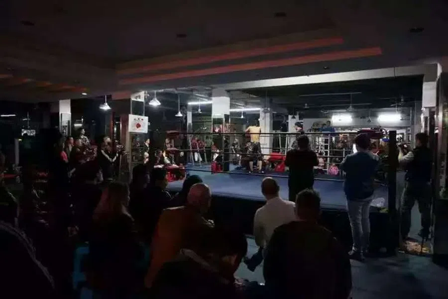 Spectators look on at a wrestling match. (Photo: MKW)