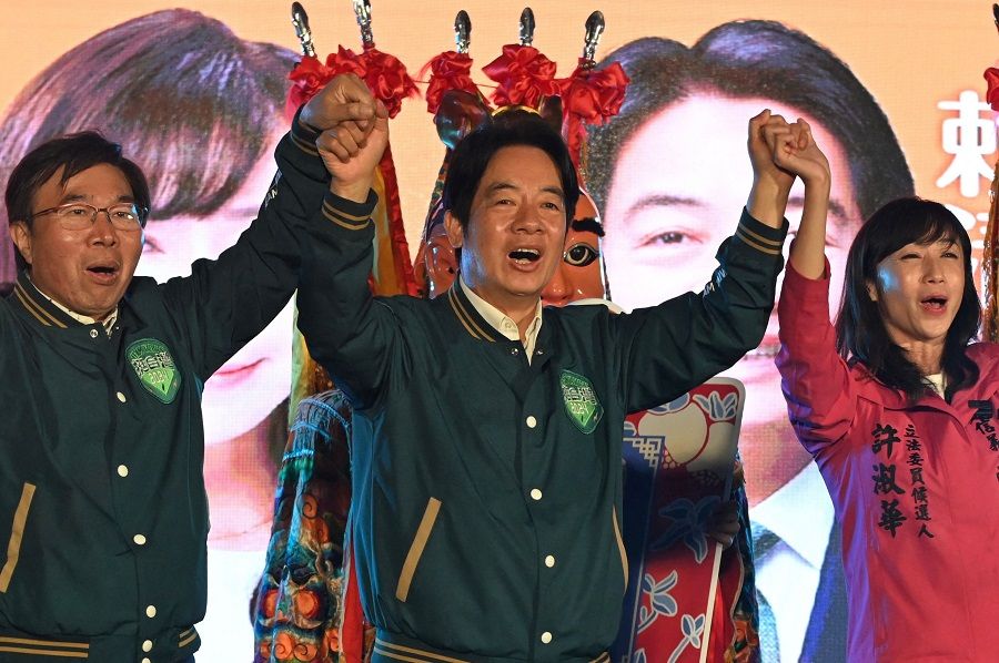 Taiwan presidential candidate William Lai Ching-te (centre), from the ruling Democratic Progressive Party (DPP), gestures during an election campaign in Taipei on 30 November 2023. (Sam Yeh/AFP)