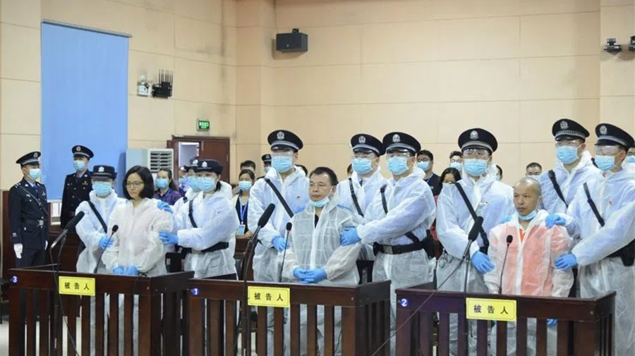 Chen Jieren (middle) was sentenced to 15 years in prison.