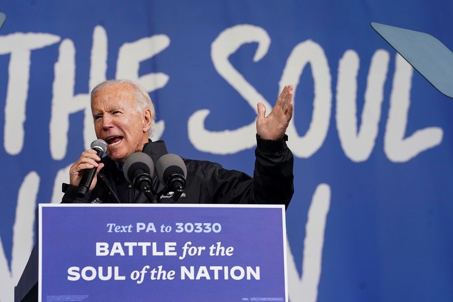 US Democratic presidential candidate Joe Biden gestures as he speaks during a campaign event in Philadelphia, Pennsylvania, US, 1 November 2020. (Kevin Lamarque/Reuters)