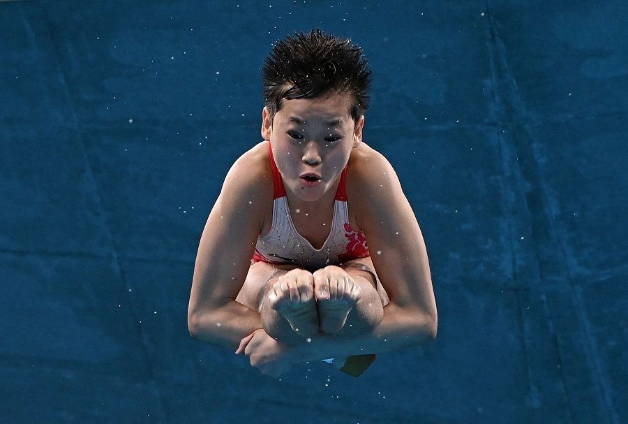 China's Quan Hongchan competes in the women's 10m platform diving finals event during the Tokyo 2020 Olympic Games at the Tokyo Aquatics Centre in Tokyo, Japan on 5 August 2021. (Attila Kisbenedek/AFP)