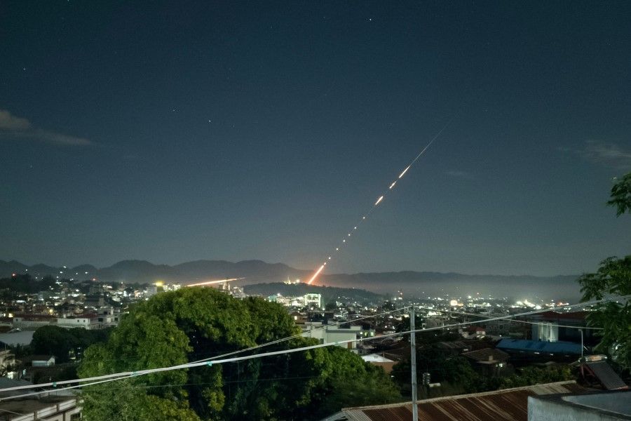 This picture taken late on 28 October 2023 shows a missile fired from a Myanmar military base in Lashio township, northern Shan State. (AFP)