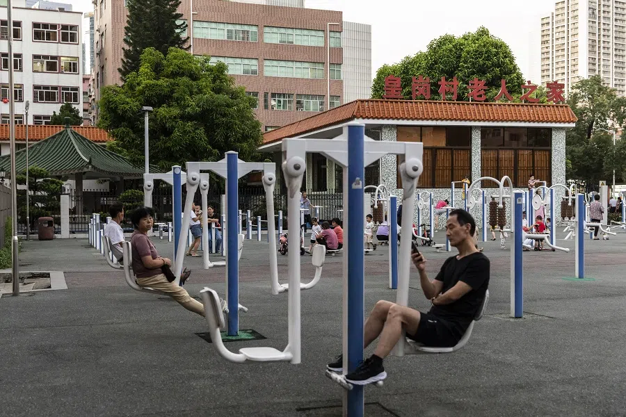 Residents at an exercise park in Huanggang village in Shenzhen, China, on 11 October 2021. (Qilai Shen/Bloomberg)